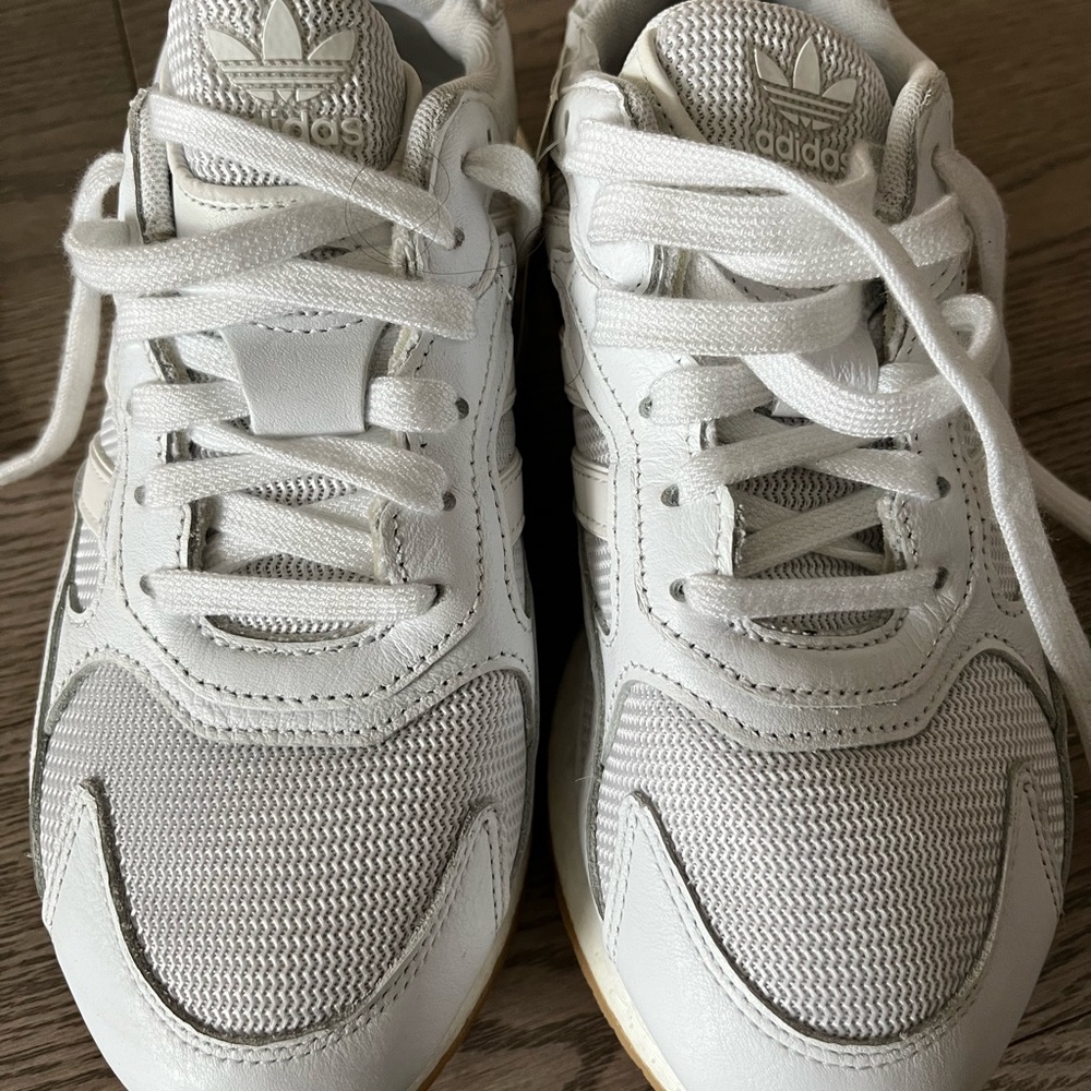 Brand new white adidas shoes